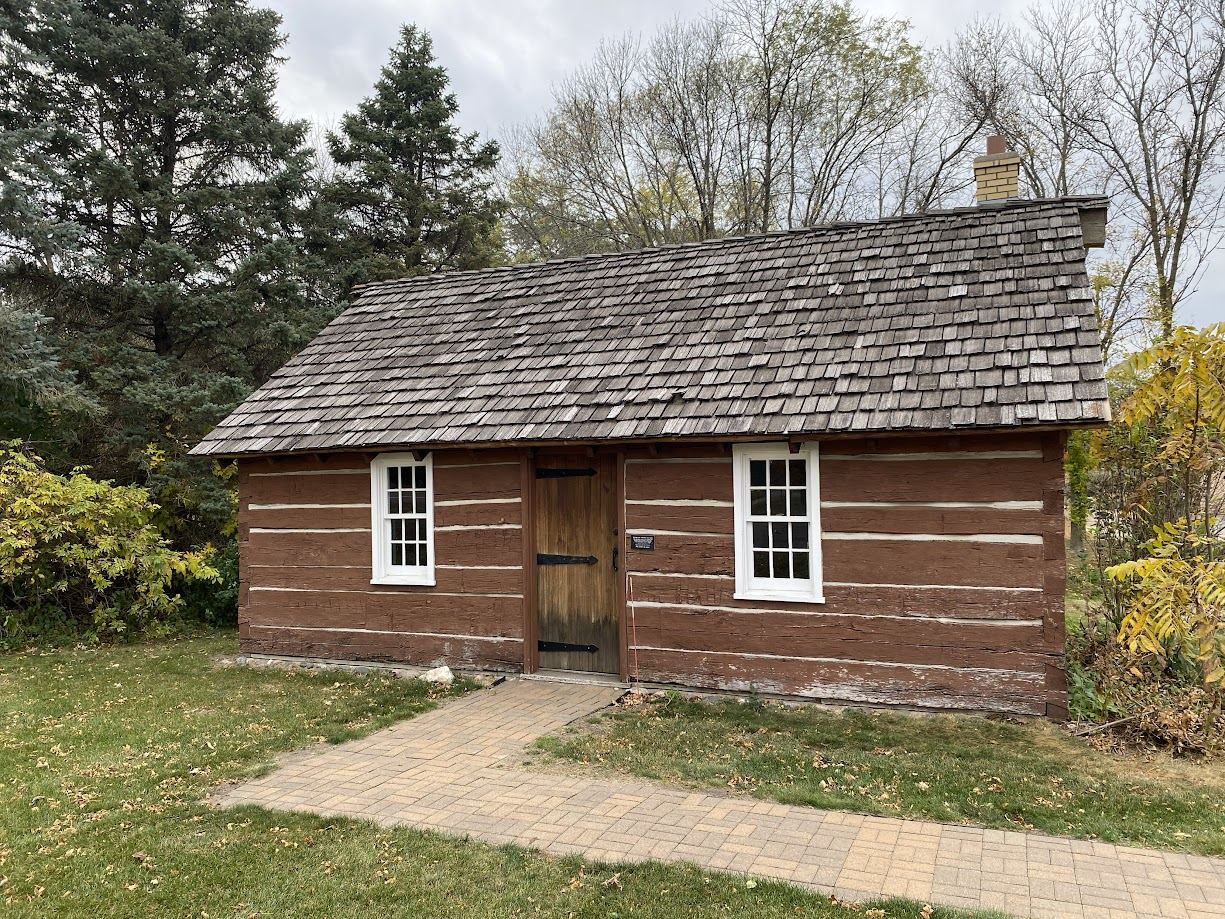 Historic 1857 cabin at Medina City Hall (originally Wolsfeld Lake)